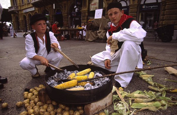 CROATIA, Kvarner, Rijeka, "Habsburg jubilee, cooking tradtional cuisine just one of many displays on the streets on Rijeka during the celebrations of the city's Habsburg heritage"