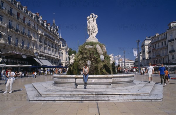 FRANCE, Languedoc Roussillon, Montpellier, Esplanade Charles de Gaulle with statue and waterfountain