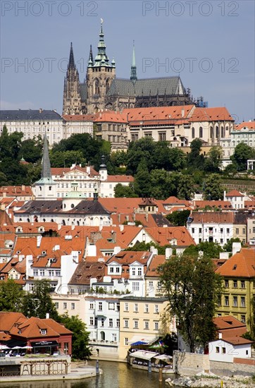 CZECH REPUBLIC, Bohemia, Prague, View across the Vtlava River to the Little Quarter and St Vitus Cathedral in Prague Castle