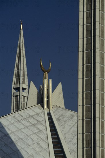 PAKISTAN, Islamabad, "Detail of the Shah Faisal mosque, white rooftop, minarets and crescent moon symbol of Islamic faith.  Design by Vedat Dalokay, construction completed 1986."