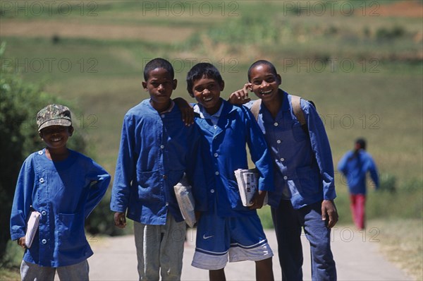 MADAGASCAR, People, Children, Near Ambositra. A group of rural school children wearing blue uniform