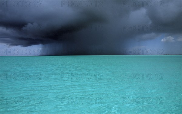 WEST INDIES, Turks and Caicos Island, Storm clouds over the ocean