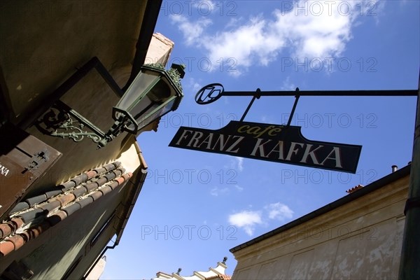 CZECH REPUBLIC, Bohemia, Prague, Hanging sign for the Franz Kafka Cafe in Golden Lane within Prague Castle in Hradcany.