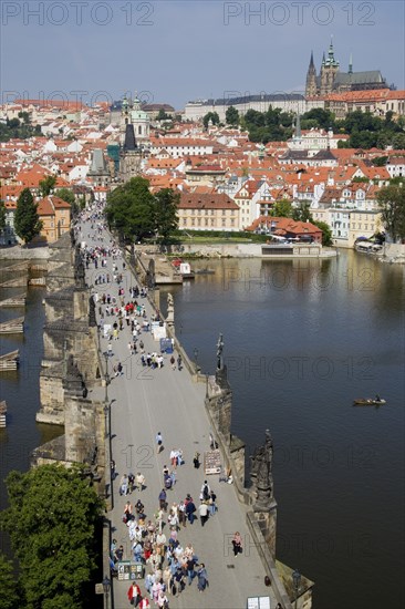 CZECH REPUBLIC, Bohemia, Prague, The Charles Bridge across the Vltava River leading to the Little Quarter and St Vitus Cathedral