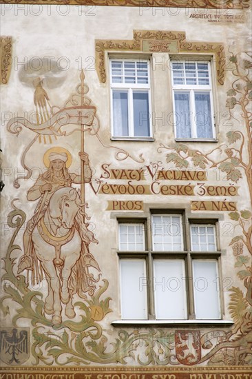 CZECH REPUBLIC, Bohemia, Prague, The Storch house in the Old Town Square with decoration based on designs by Mikulas Ales of St Wenceslas on horseback