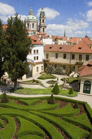 CZECH REPUBLIC, Bohemia, Prague, The 18th Century Vrtba Gardens with the Church of St Nicholas beyond in the Little Quarter
