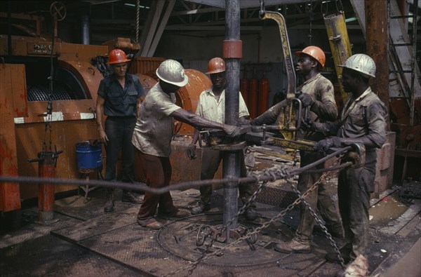 NIGERIA, Rivers State, Workers on oil rig.