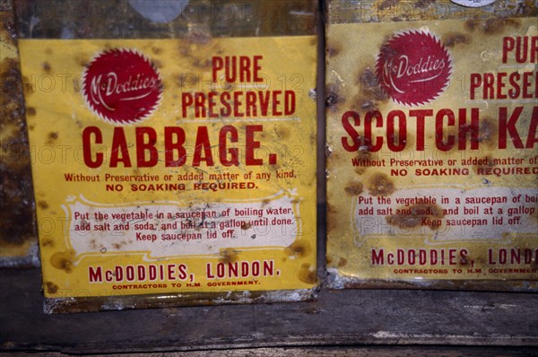 ANTARCTICA, Ross Sea, Ross Island, Cape Evans. Interior of Scotts Hut with detail of a rusty yellow and red tin of preserved cabbage