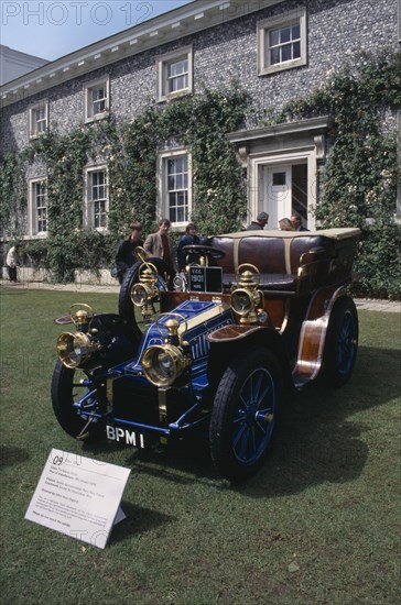 ENGLAND, West Sussex, Goodwood, Festival of Speed. Style et Luxe display  with French car on dispaly on grass built in 1901 Mors with ten horse power and has four gears in forward and four in reverse