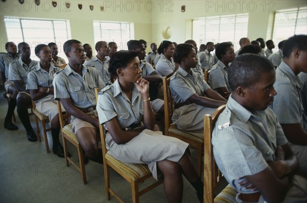 BARBADOS, Education, Male and female students in regional police training college.