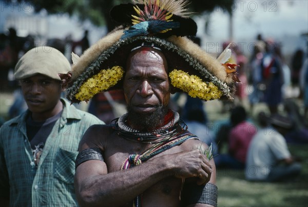 PACIFIC ISLANDS, Melanesia, Papua New Guinea, Southern Highlands. Tari. Huli Tribe Wigmen. Man in elaborate headdress taking part in Sing Sing festival