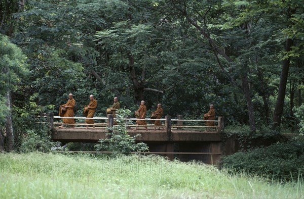 THAILAND, Monks, Buddhist monks on morning alms round.