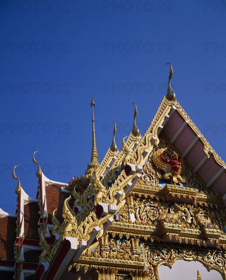 THAILAND, Bangkok, "Detail of the highly decorated, golden roof of the Royal Palace."