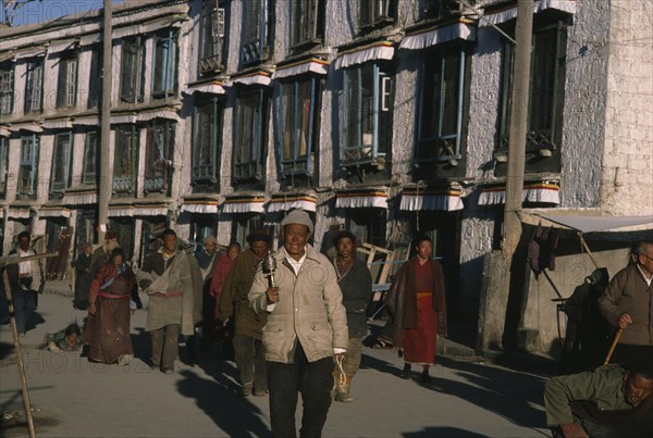 TIBET, Lhasa, Pilgrims at Jokhang Monastery.