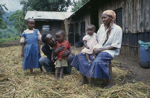 KENYA, Muhuroni, Peter Mwaura and family at his shamba at Chichila.  Peter practises organic farming techniques to avoid buying expensive fertilisers.