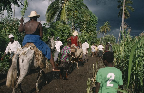 HAITI, Voodoo, Saut d’Eau pilgrimage to waterfall which voodooists visit to bathe and purify themeselves and light candles to enlist the help of ancient spirits.