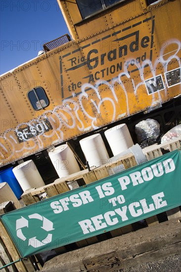 USA, New Mexico, Santa Fe, Recycling area by the railway lines and old trains