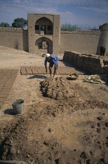 IRAN, Yazd Province, Meybod, Mud brick maker
