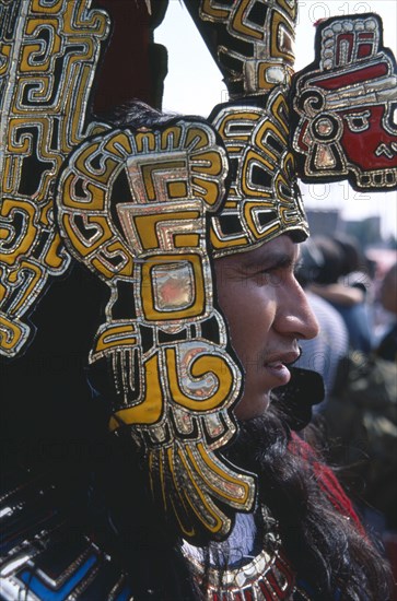 MEXICO, Mexico City, Our Lady of Guadaloupe Festival male Indian dancer outside the Basilica