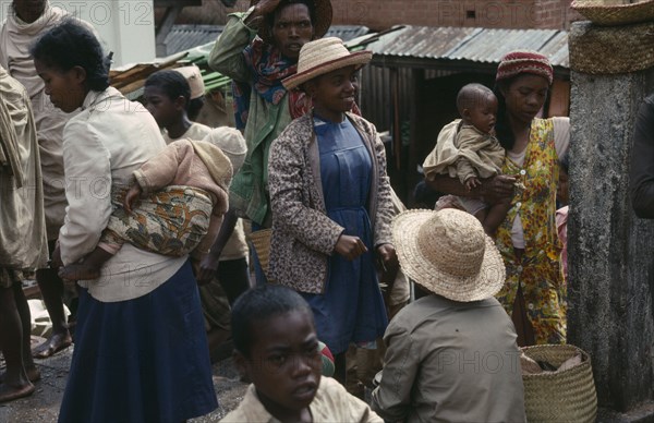 MADAGASCAR, Antananarivo, "Busy street scene; men, women and children."