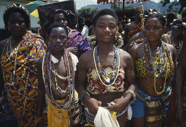 GHANA, Volta Region, Hohoe District, Wli Agumatsa waterfall festival commemorating and giving thanks to waterfalls regarded as a protective fetish by the local people.  Girls in traditional dress and jewellery.