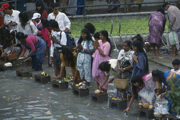 MAURITIUS, People, "Crowds with offerings of incense, fruit and flowers at the Grand Bassin lake during the Maha Shivaratree festival in honour of the Hindu god Siva."