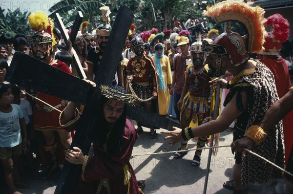 PHILIPPINES, Marinduque, Boac, Moriones Festival passion play re-enactment of the story of the Roman soldier Longinus and the crucifixtion of Jesus on Good Friday.