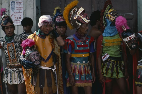 PHILIPPINES, Marinduque, Boac, Moriones Festival passion play re-enactment of the story of the Roman soldier Longinus and the crucifixtion of Jesus.  Local men dressed as Roman soldiers with masks.