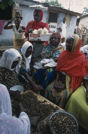 GHANA, Industry, Women’s group near Accra making palm nut oil.