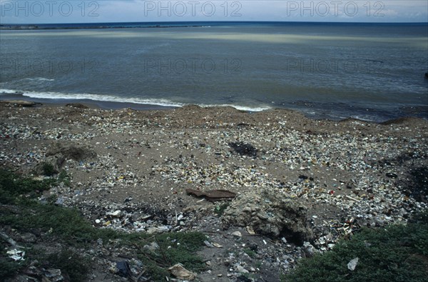 WEST INDIES, Dominican Republic, Santo Domingo, Polluted seashore.