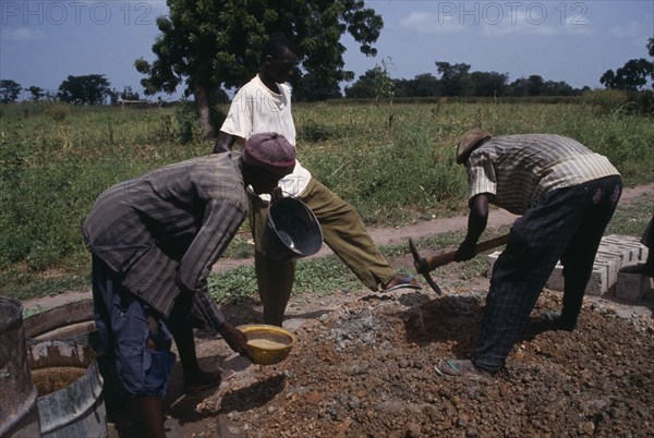 GAMBIA, People, Work, Men building rural school.
