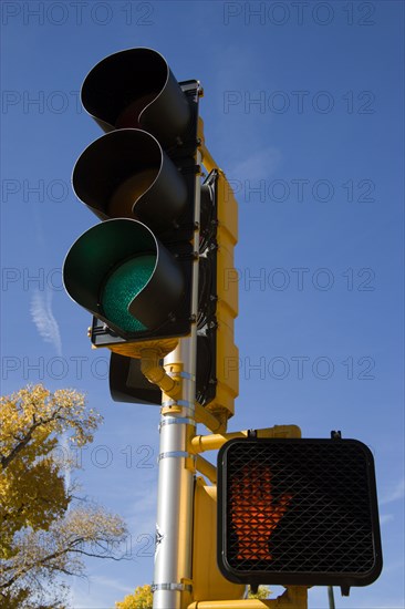 USA, New Mexico, Santa Fe, Traffic lights showing green and pedestrian lights showing red on the Old Santa Fe Trail