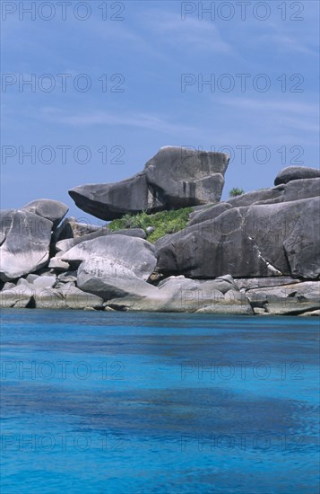 THAILAND, Koh Similan  , Donald Duck Bay, A rock which resembles the cartoon character perches next to other large boulders.
