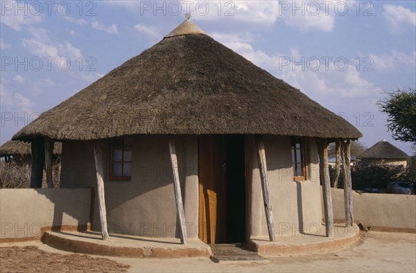 BOTSWANA, Kopong, Traditional circular hut with thatched roof.