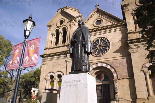 USA, New Mexico, Santa Fe, Statue of Archbishop Lamy outside the front of the Cathedral Of St Francis