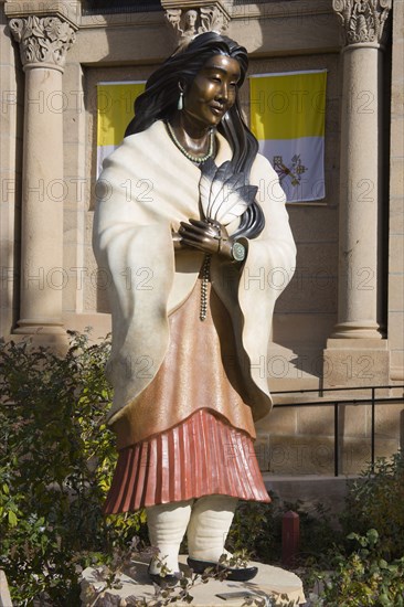 USA, New Mexico, Santa Fe, Statue outside the front of the Cathedral Of St Francis of the Algonquin / Mohawk Native American the Blessed Kateri Tekulwitha