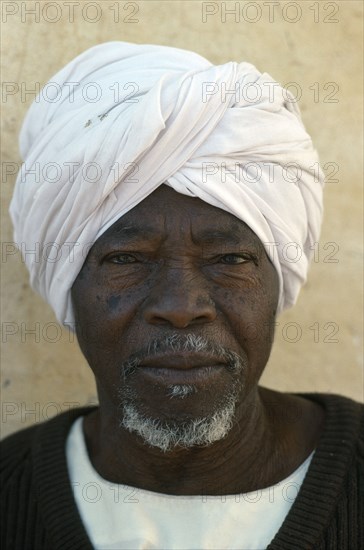 SUDAN, People, Men, Head and shoulders portrait of Chadian refugee man.