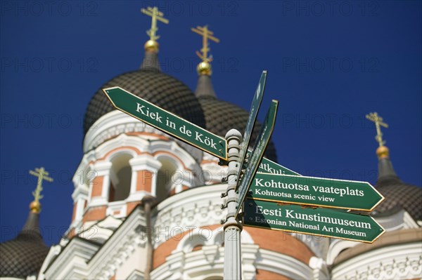 ESTONIA, Tallinn, Pedestrian signpost beneath Alexander Nevsky Cathedral in the Toompea district of the Old Town.