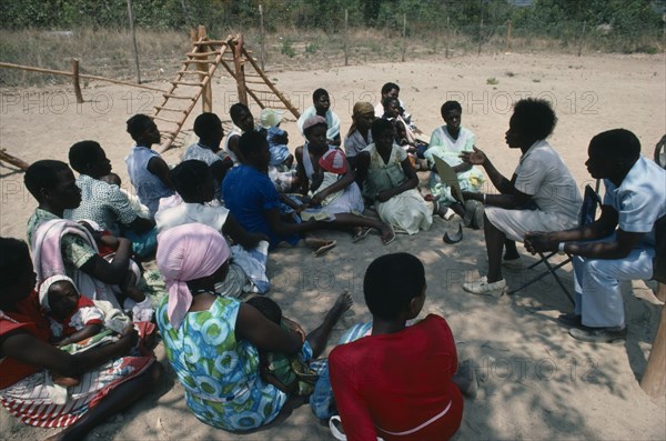 ZIMBABWE, Medical, Mobile clinic giving advice to mother and baby group.