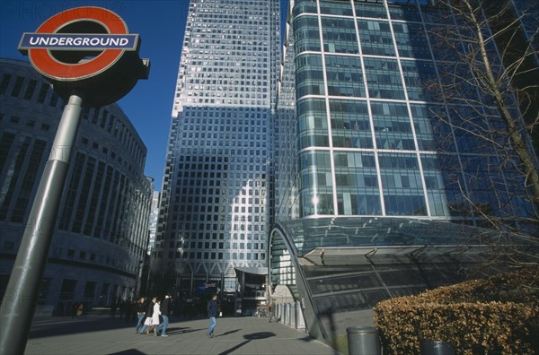 ENGLAND, London, Canary Wharf. View of the tower at 1 Canada Square with Underground in the foreground.