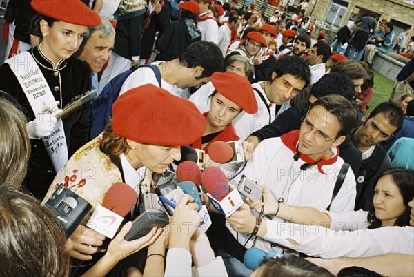 SPAIN, Hondarabia, The Basque Country, Basque sufragette leader is interviewed by local Basque media during the festival of El Alarde on 8 September.