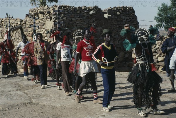 MALI, Ceremony, Dogon funeral dance.  Dancers wear masks depicting mythical animals and believe their spirits enter them.