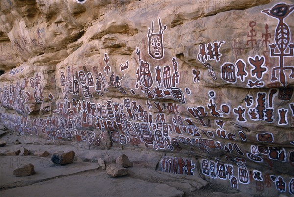 MALI, Bandiagara Escarpment, Dogon rock paintings at sacred site of circumcision rituals which take place every three years.  Each new initiate adds his own personal symbol.