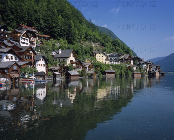 AUSTRIA, Salzburg, Dachstein, "Village of Hallstatt on West of Hallstattersee. Wooden fronted buildings with balconies, hotels, boat sheds, next to lake."