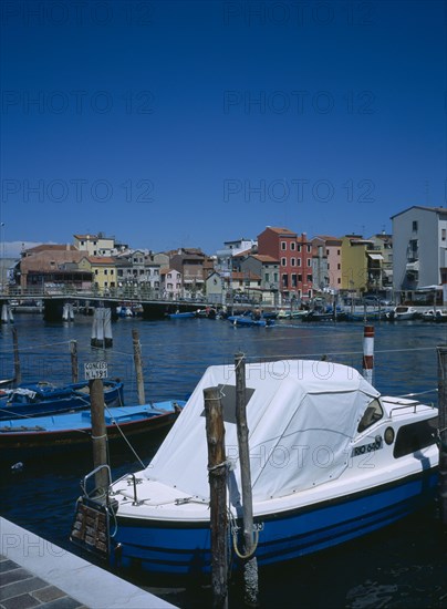 ITALY, Veneto, Chioggia, "The seaside town by the Adriatic Sea., South end of Laguna Venata,  Ferry and Fishing Port. Docked boats in foreground"