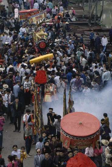 VIETNAM, North, Festivals, Procession for Tet or New Year firecracker festival.