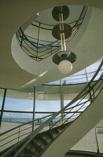 ENGLAND, East Sussex, Bexhill on Sea, De La Warr Pavilion. Interior of the helix like spiral staircase and Bauhaus globe lamps.