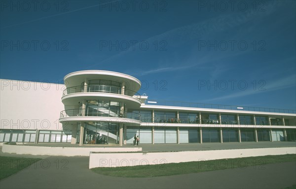 ENGLAND, East Sussex, Bexhill on Sea, De La Warr Pavilion. Exterior view from seafront towards back entrance with staircase section and terracing.