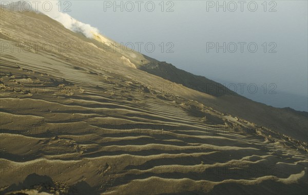 ITALY, Sicily, Stromboli Island, Volcanic landscape and smoking cone.