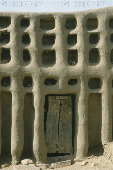 MALI, Sangha, Exterior of house of Dogon village ‘Hogon’ or healer priest with fetish niches